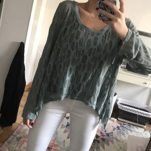 Long sleeve blue shirt.